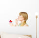 Woman holds cake strawberry cupcake Wall Decal