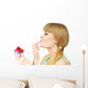 Woman holds cake strawberry cupcake Wall Decal