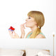 Woman holds cake strawberry cupcake Wall Decal