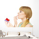 Woman holds cake strawberry cupcake Wall Decal