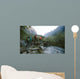 Group of trekkers cross the bridge Wall Mural