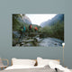 Group of trekkers cross the bridge Wall Mural
