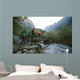 Group of trekkers cross the bridge Wall Mural
