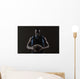 Portrait of basketball player holding a ball Wall Mural