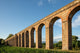 Ancient Italian Aqueduct in Evening Light Wall Mural