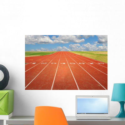 Running Track with Clouds Wall Mural shown on a wall