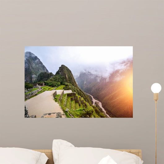 Machu Picchu - the UNESCO heritage in summer time with sunset Wall Mural