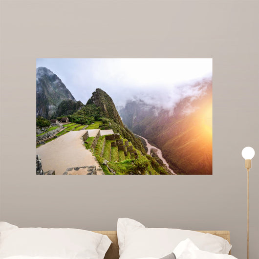 Machu Picchu - the UNESCO heritage in summer time with sunset Wall Mural
