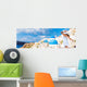 Europe tourist travel woman panorama banner from Oia, Santorini, Greece. Happy young woman looking at famous blue dome church landmark destination. Beautiful girl visiting the Greek islands. Wall Mural