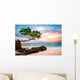 Exotic seascape with sea grape trees leaning above a rocky Caribbean beach at sunset, in Cayo Levantado, Dominican Republic Wall Mural