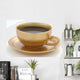 Gold Cup of Coffe on White Background Wall Decal