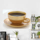 Gold Cup of Coffe on White Background Wall Decal