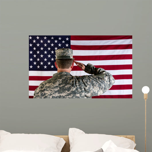 Veteran male solider saluting the flag of USA Wall Mural
