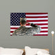 Veteran male solider saluting the flag of USA Wall Mural