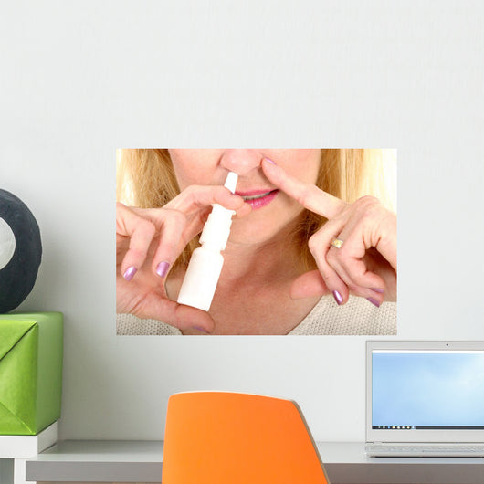 Spraying Nasal Spray in Nose Wall Mural