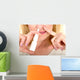 Spraying Nasal Spray in Nose Wall Mural
