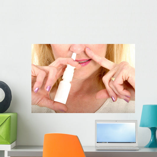 Spraying Nasal Spray in Nose Wall Mural