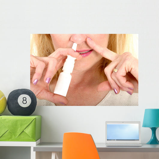 Spraying Nasal Spray in Nose Wall Mural