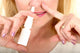 Spraying Nasal Spray in Nose Wall Mural