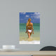 Beautiful Young Blond Woman in a Bikini Wall Mural