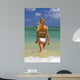 Beautiful Young Blond Woman in a Bikini Wall Mural