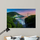 Hudson River valley with Bear Mountain bridge illuminated by night, in New York state Wall Mural