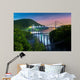 Hudson River valley with Bear Mountain bridge illuminated by night, in New York state Wall Mural