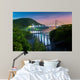 Hudson River valley with Bear Mountain bridge illuminated by night, in New York state Wall Mural