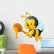 Cartoon bee holding honey Wall Decal