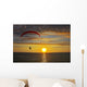 The parachute above the sea on a sunset Wall Mural