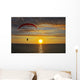 The parachute above the sea on a sunset Wall Mural