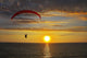The parachute above the sea on a sunset Wall Mural