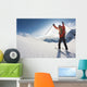 Skier Reaches His Arms up Wall Mural