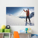 Skier Reaches His Arms up Wall Mural