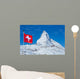 Famous Matterhorn with flag of switzerland Wall Mural
