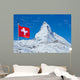 Famous Matterhorn with flag of switzerland Wall Mural