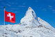 Famous Matterhorn with flag of switzerland Wall Mural