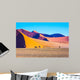 The sharp crests of orange dunes Wall Mural
