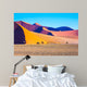 The sharp crests of orange dunes Wall Mural