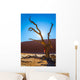  Dry picturesque tree decorated with silk scarf Wall Mural