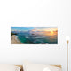 Panoramic view of tropical beach with surfers at sunset. Wall Mural
