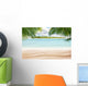 Sandy tropical beach with island on background Wall Mural