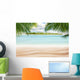 Sandy tropical beach with island on background Wall Mural