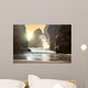 Fantastic big rocks and ocean waves at sundown time Wall Mural