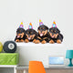 Group of puppies Rottweiler with birthday hats. isolated on white Wall Decal