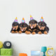 Group of puppies Rottweiler with birthday hats. isolated on white Wall Decal
