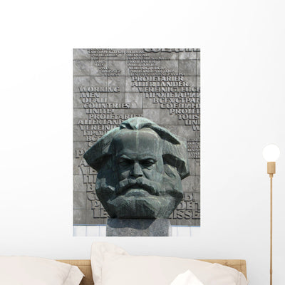 Karl Marx Statue Wall Mural shown on a wall