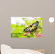butterfly feeding on a flower Wall Mural