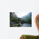 Group of hikers crossing the bridge Wall Mural