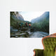 Group of hikers crossing the bridge Wall Mural